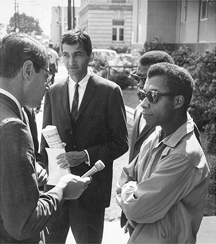 Howard Zinn, James Baldwin, and a journalist on Freedom Day in October, 1963.