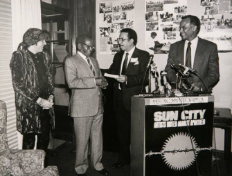  Little Steven van Zandt, producer of "Sun City"; Oliver R. Tambo; Tilden LeMelle, and Harry Belafonte, MC of the