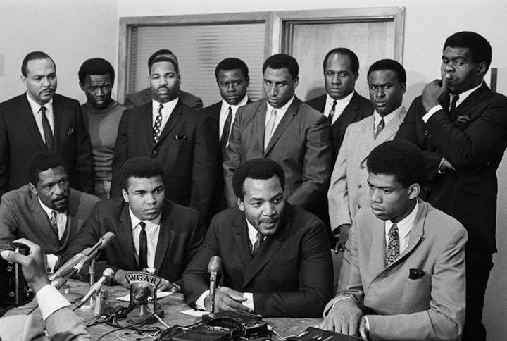 On June 4, 1967, black athletes met in Cleveland to discuss their support for Ali. How many can you recognize? Click on the image for a story about this historic meeting and names of all the attendees.