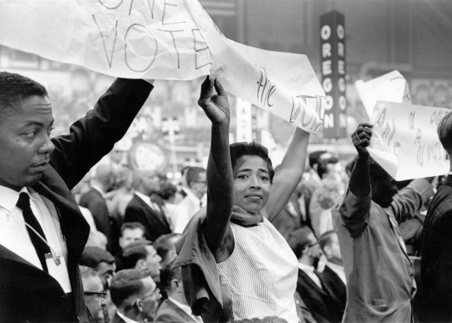 MFDP delegates demonstrate as President Lyndon Johnson is being nominated. Victoria Gray from Hattiesburg, the woman at center, is a prominent MFDP leader. George Ballis Atlantic City, New Jersey, 1964
