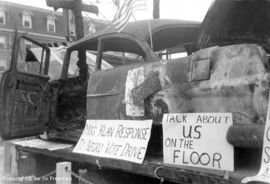 The FDP brought this car to Atlantic City to show the delegates and press at the Democratic Convention how Mississippi blacks were treated when they tried to register to vote. Image: Jo Freeman.